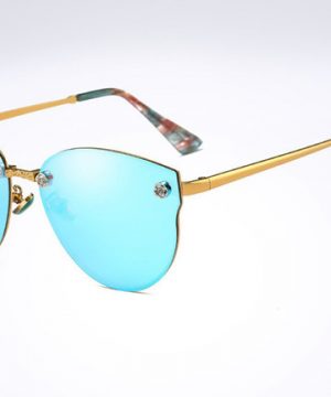 Moderné elegantné dámske slnečné okuliare v modro-zlatej farbe