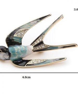 LUXUSNÁ BROŠŇA NA ŠATY V TVARE PREPRACOVANEJ LASTOVIČKY