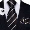 Kravatový set v čiernej farbe s pásikmi ( kravata + vreckovka + manžety )
