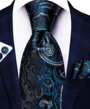 Prepracovaná kravatová sada v modrej farbe ( kravata + manžety + vreckovka )